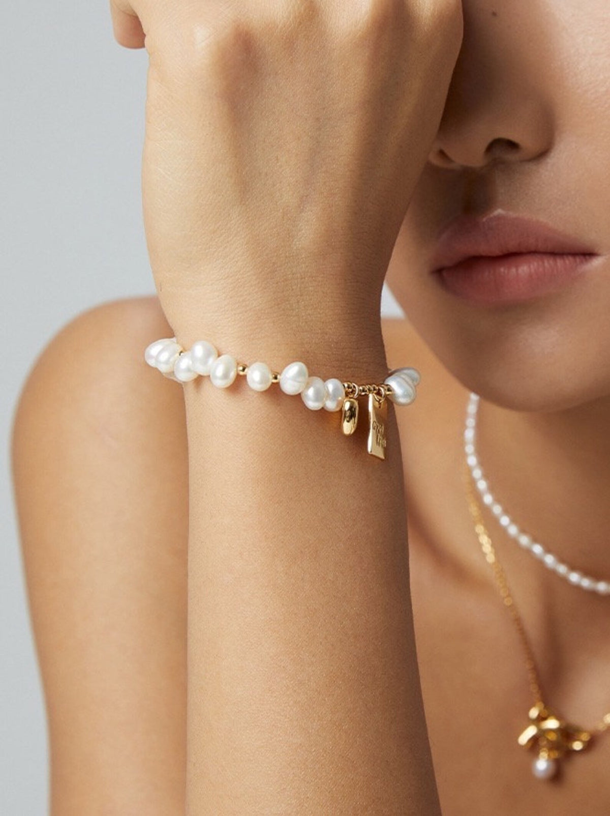 Handcrafted Freshwater Pearl Bracelet with Gold Heart & Good Luck Tag