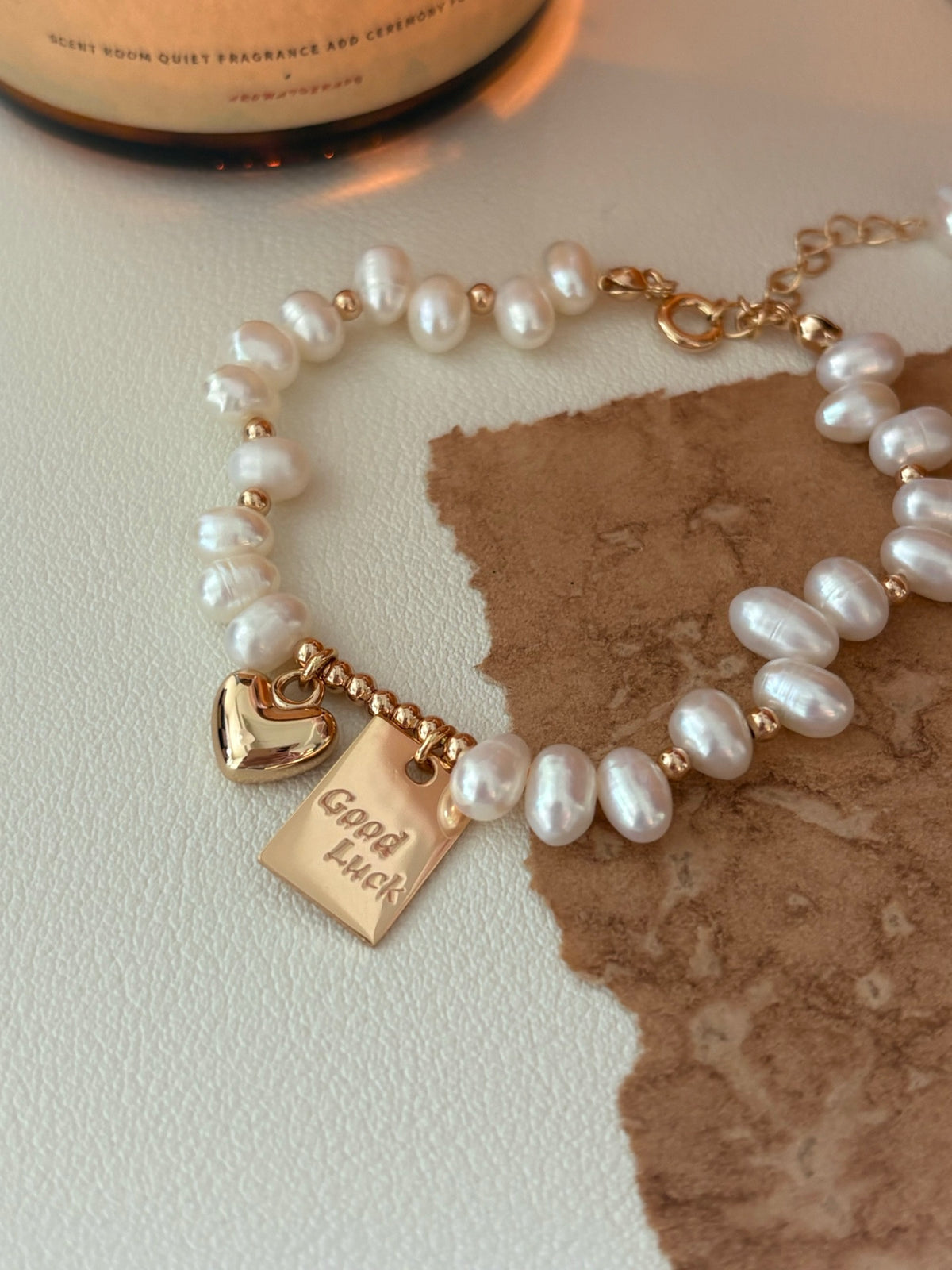 Handcrafted Freshwater Pearl Bracelet with Gold Heart & Good Luck Tag