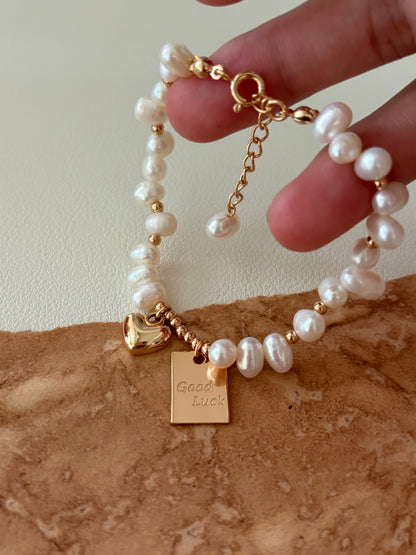 Handcrafted Freshwater Pearl Bracelet with Gold Heart & Good Luck Tag