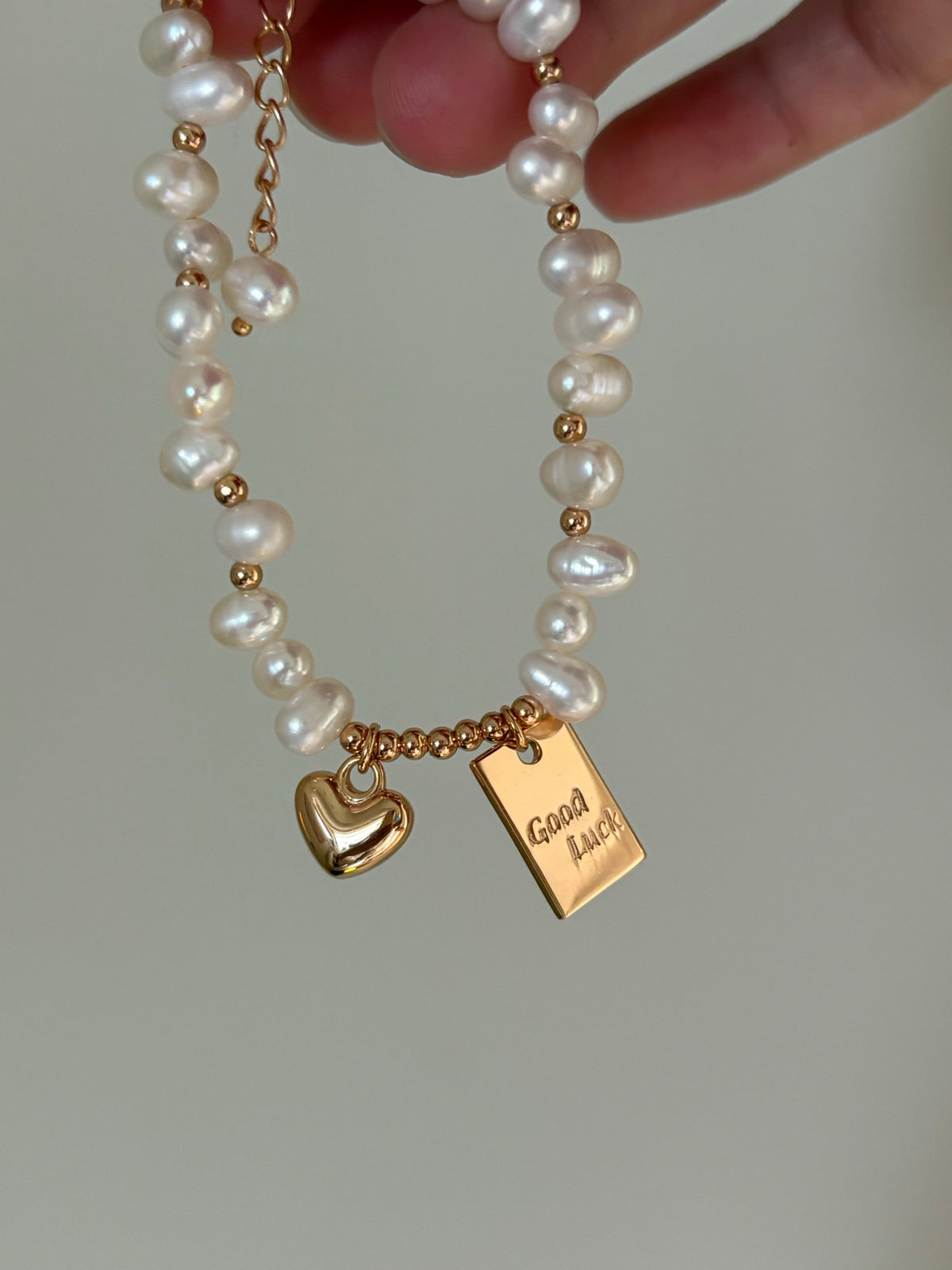 Handcrafted Freshwater Pearl Bracelet with Gold Heart & Good Luck Tag