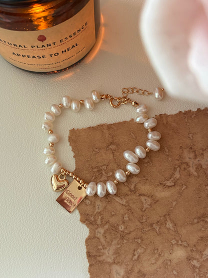 Handcrafted Freshwater Pearl Bracelet with Gold Heart & Good Luck Tag