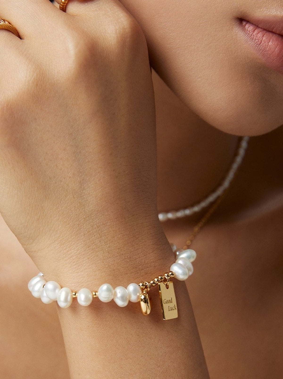 Handcrafted Freshwater Pearl Bracelet with Gold Heart & Good Luck Tag